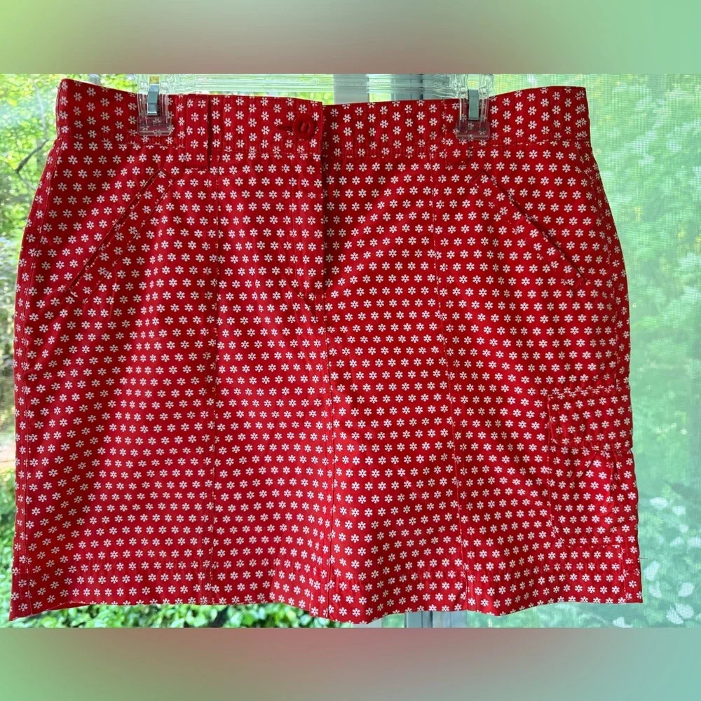 Lands End 12 Dark Orange & White floral Skorts. Front slant pockets, hip pocket